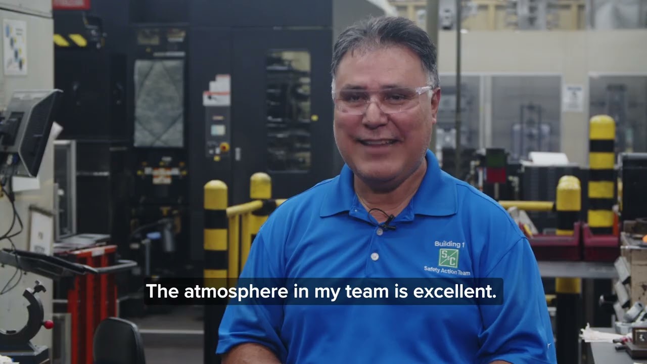 S&C employee wearing safety glasses in a manufacturing room